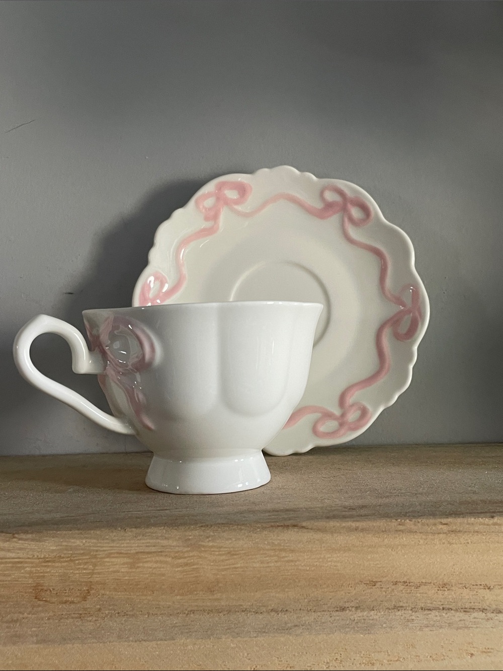 Crofton Aldi White Ceramic Teacup and Saucer with Pink Ribbon Bow Trim